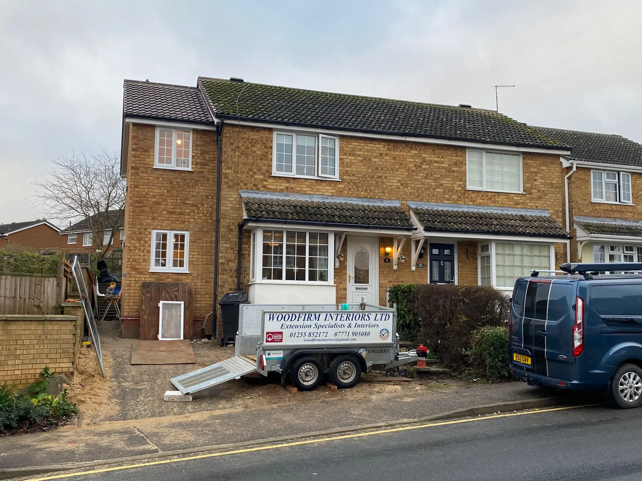 a house with a truck parked in front of it